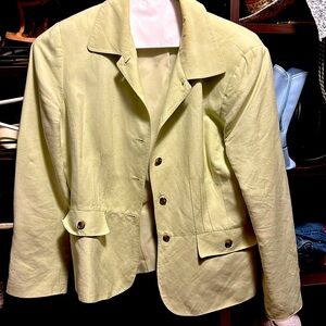 Woman’s Tahari light green button jacket with brown buttons.  Size 10
